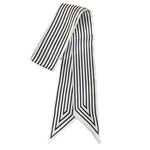 Minimalist striped hair scarf in cream and navy blue with pointed ends and twill texture