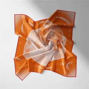 Detail of orange square silk scarf with space star pattern and smooth satin texture