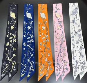 Narrow silk scarves with vintage key patterns for handbag handles in five colors