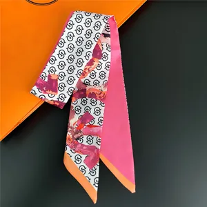 Narrow long silk scarf with artistic geometric patterns and elegant pointed ends