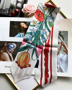 Floral silk feeling narrow scarf detail with poppy pattern and elegant border