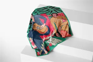Detail of artistic floral silk scarf showing Matisse-style print and green hand-rolled edges