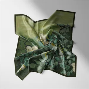Detailed view of silk square scarf featuring Van Gogh style iris floral print on beige wall