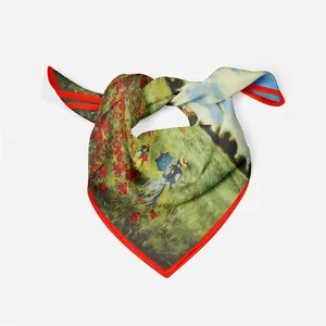 Detailed view of Monet style red poppy floral print on a silky square scarf texture