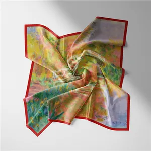 Detail of Monet's Japanese Bridge silk scarf showing oil painting texture and red hem