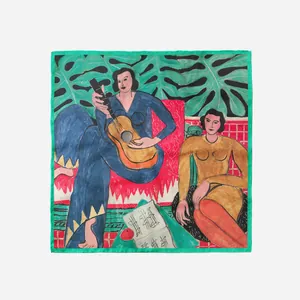 Detailed macro view of Matisse style art print and green rolled edges on silk square scarf