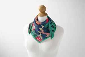 Artistic Van Gogh style silk scarf with sunflower and rose patterns on a mannequin