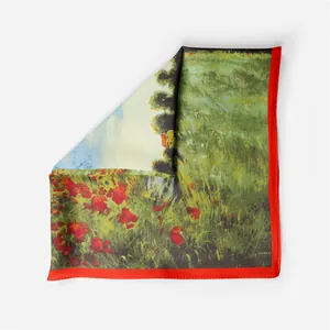 Detailed shot of Van Gogh sunflower silk scarf with elegant red hand-rolled edges
