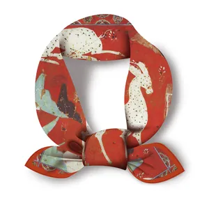 Detailed view of red silk scarf with white deer pattern in Dunhuang mural art style