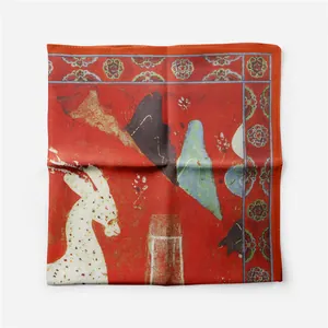 Detail of artistic silk square scarf featuring traditional red nine-colored deer mural art