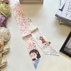Detail of pink and white silk scarf with daisy patterns and cute girl illustration