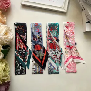 Detail view of four floral horse pattern silk scarves with twill texture and vibrant prints