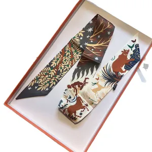 Forest theme silk twilly scarf with bear and bird prints in luxury orange border gift box