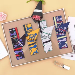 Silk twilly scarf collection with vintage equestrian prints for handbag handles