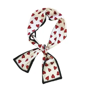 Long white silk-like neck scarf with red heart patterns and black edges for women
