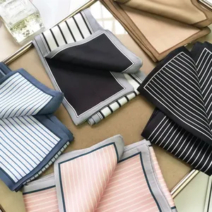 Striped silk scarf for women featuring premium lustrous fabric in classic color patterns