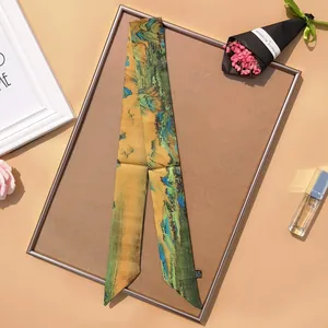 Elegant Chinese landscape print skinny silk scarf displayed in a vintage frame
