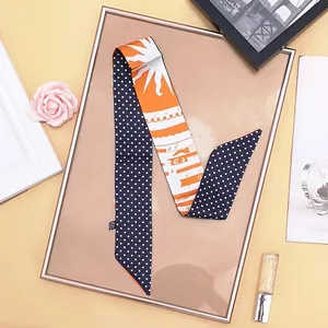 Polka dot and sun pattern silk twilly scarf in navy blue and orange for handbag decoration