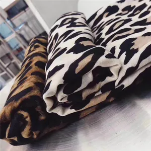 Classic leopard print long silk scarf for women in brown and cream color tones