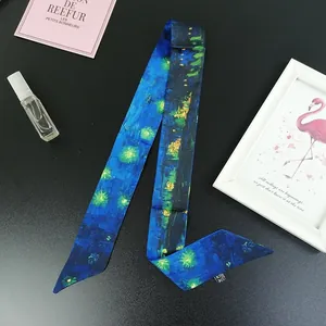 Detail of artistic Van Gogh Starry Night style narrow silk ribbon scarf tied on a bag handle