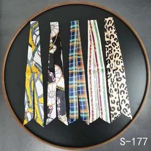 Assorted silk scarves for handbag handles with chain, plaid, and leopard patterns