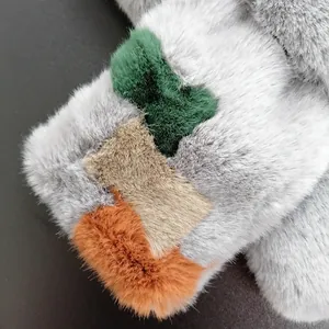 Winter faux rabbit fur scarf featuring a modern grey and colorful geometric patchwork design