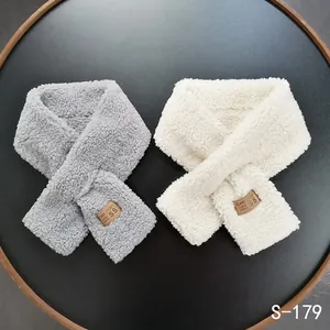 Winter plush lamb wool scarf in grey and beige colors with a cross-over closure design