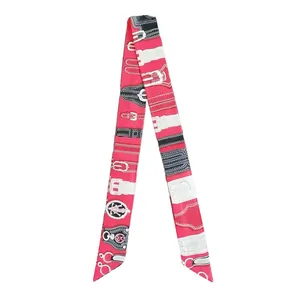 Pink and black skinny silk scarf with classic horse harness and buckle pattern on white base