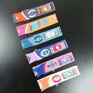 Silk twilly scarf set featuring equestrian horse bit patterns and geometric color blocks