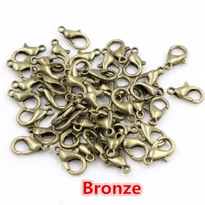 Macro detail of bronze zinc alloy lobster clasps for DIY jewelry making and bag chains