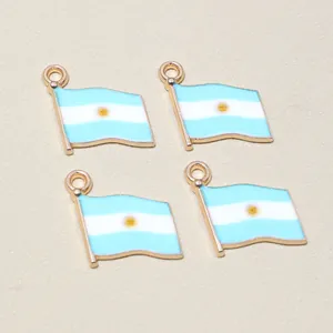 Detailed close-up of four Argentina flag alloy charms with gold borders and enamel finish