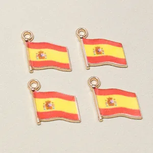 Detail of four Spanish flag alloy pendants with enamel finish for DIY jewelry crafts