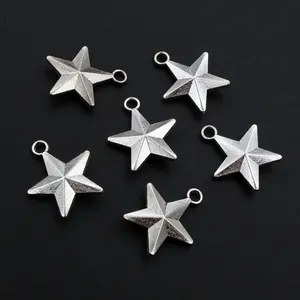 Detailed macro view of 3D silver star charms for DIY jewelry making and pendants