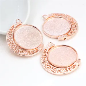 Detailed view of rose gold 25mm rotating DIY pendant trays with glitter center settings