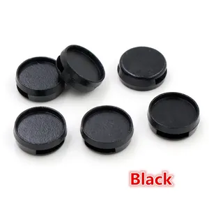 Detail of six black matte 12mm slider bead bases with rectangular holes for DIY jewelry