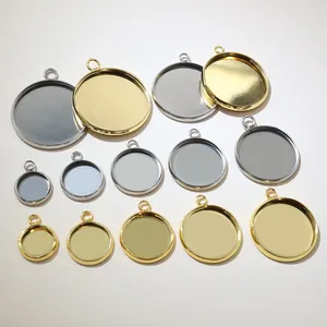 Detail of round stainless steel DIY bezel trays in various sizes and gold-silver tones