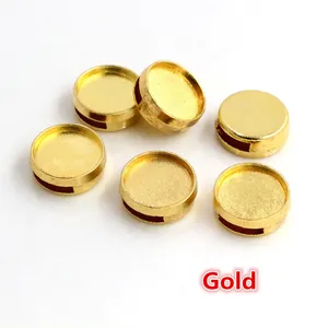 Close-up of golden jewelry DIY base connector with rectangular threading holes