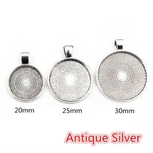 Three antique silver round pendant trays with 20mm, 25mm, and 30mm inner diameters
