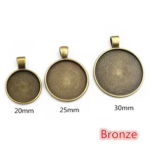 Three sizes of bronze circular bezel trays for DIY jewelry making with spiral patterns