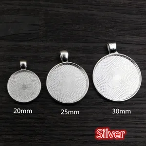 Three silver pendant trays in 20mm 25mm and 30mm sizes with inner spiral textures