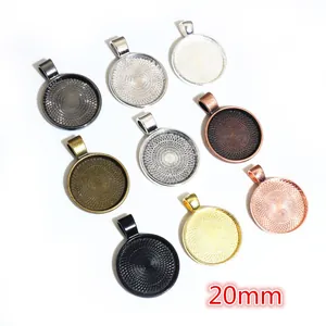 Set of eight 20mm round metal pendant trays in various colors for DIY jewelry making