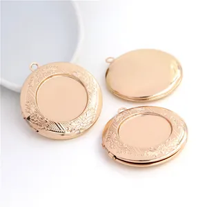 Detailed view of rose gold copper locket pendants with intricate floral engravings