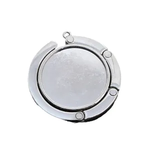 Accroche-sac pliable en métal argenté pour table avec base ronde et anneau de suspension