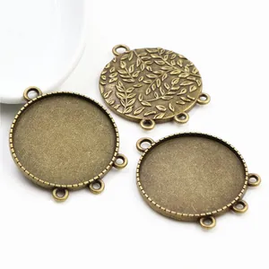 Vintage bronze alloy pendant base with 30mm inner diameter and leaf texture for DIY jewelry