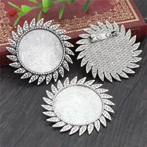 Vintage silver 30mm leaf alloy brooch base for DIY jewelry making on wooden background