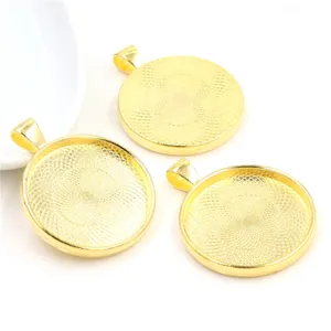 Three round gold alloy pendant trays with 30mm inner diameter for DIY jewelry making