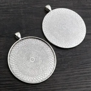 Base de colgante redonda de aleación de plata con patrones geométricos para joyas DIY