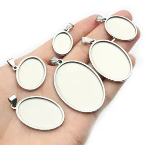 Six different sizes of oval stainless steel bezel trays for DIY jewelry making in palm