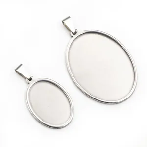 Macro shot of oval stainless steel cabochon pendant base trays for jewelry making