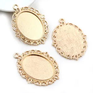Macro shot of oval gold alloy cabochon base with vintage lace hollow edges and textures